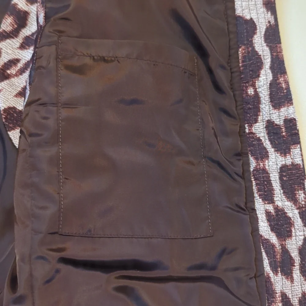 CAbi, Juliet animal print puffer vest. Medium